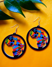 Load image into Gallery viewer, african flag earrings on yellow background
