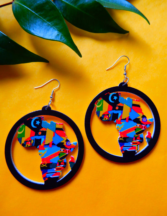 african flag earrings on yellow background