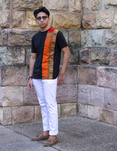 Load image into Gallery viewer, wax print t-shirt on orange 
